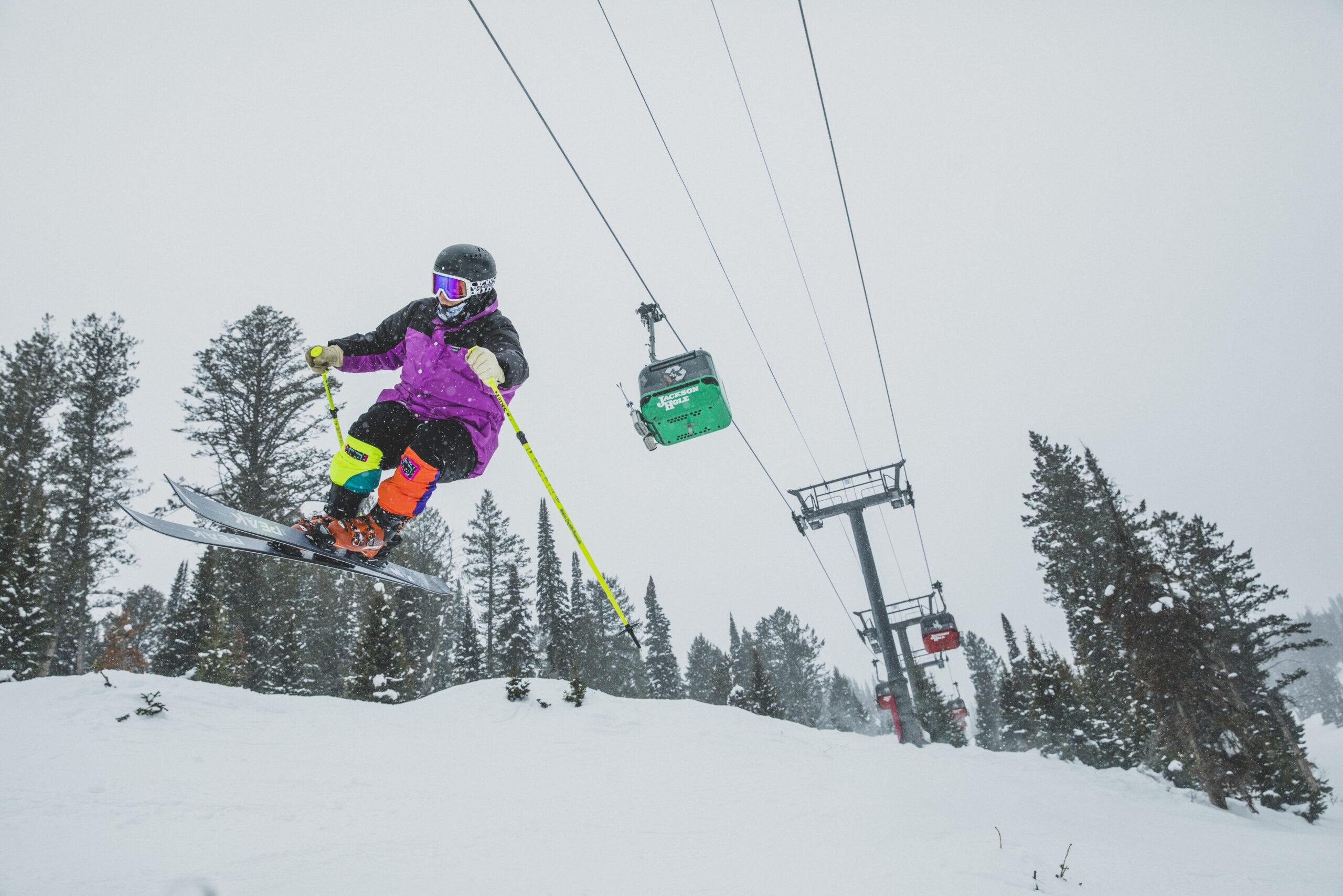 Skier catches air under the Jackson Hole gondola
